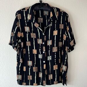 Very soft, patterned with black background, shirt by units size large